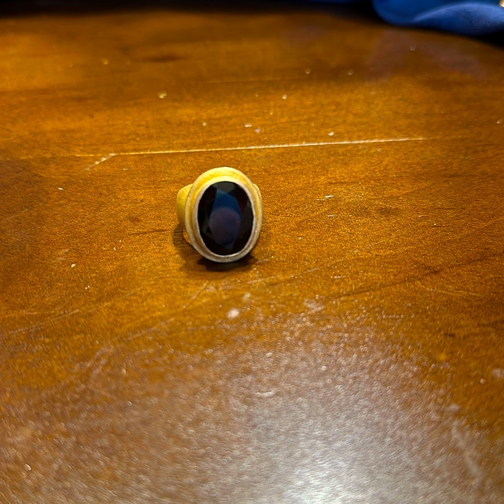 Beautiful women’s ring with dark center stone